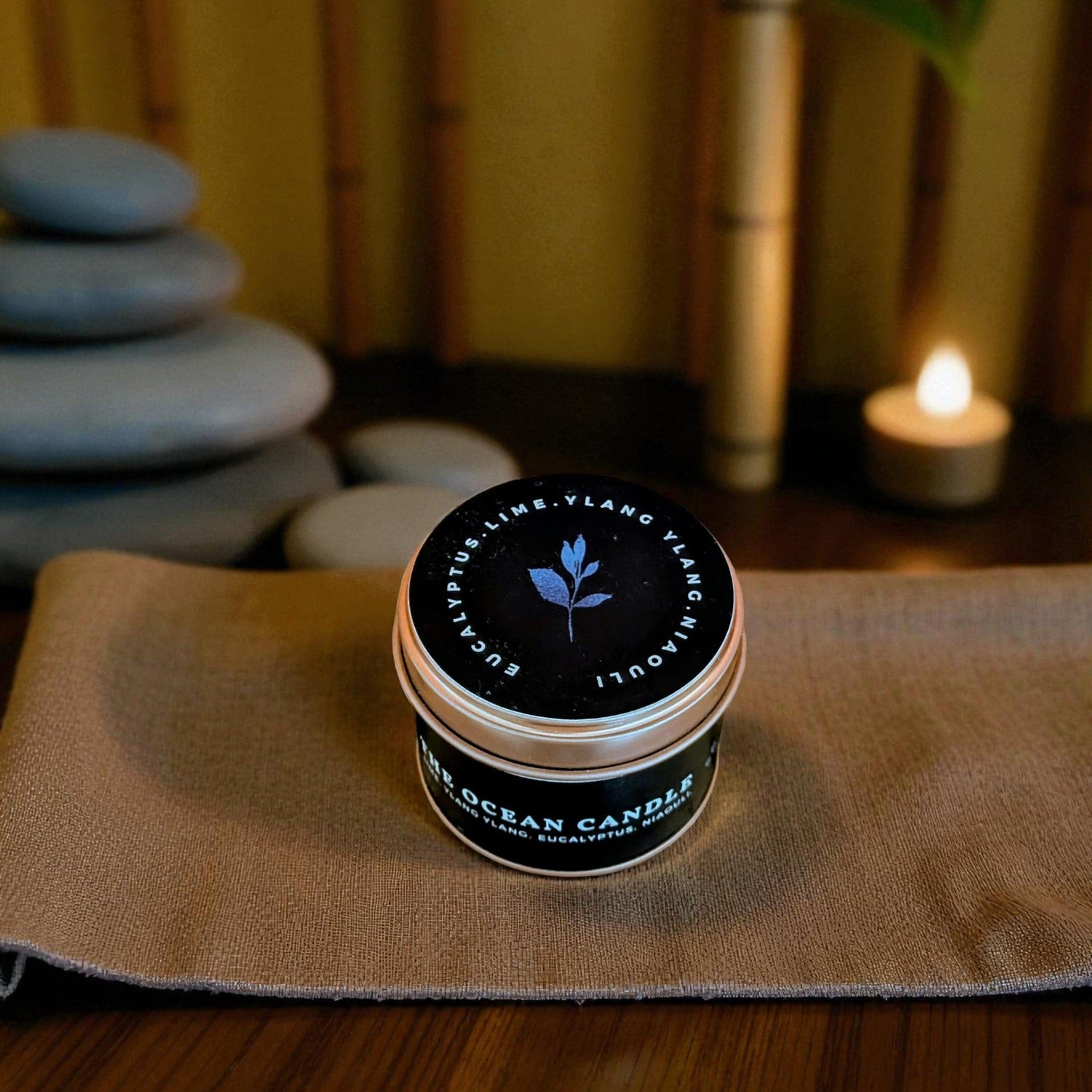 The Ethical Leaf Discover the calming atmosphere of our Essential Oil-infused Ocean Candle. Expertly crafted with natural scents of Eucalyptus, Ylang Ylang, Lime, and Niaouli, this invigorating aroma evokes the sensation of a serene beach walk. The Ocean Tin Candle
